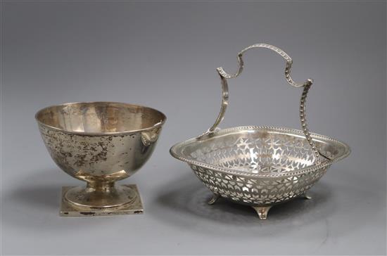 An early 19th century Danish circular silver footed bowl, with pricked inscription H. V. B. 1805 and a pierced silver cake basket,